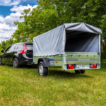 fre_pm_Remorque-routiere-avec-bache-haute-arceau-H-800-et-roue-jockey-230×125-Garden-Trailer-230-KIPP-4188_9.png